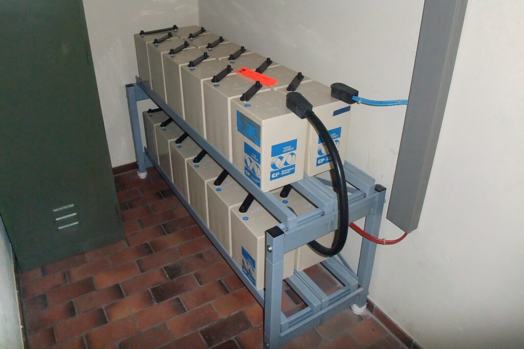 Rack of backup batteries in an electrical equipment room