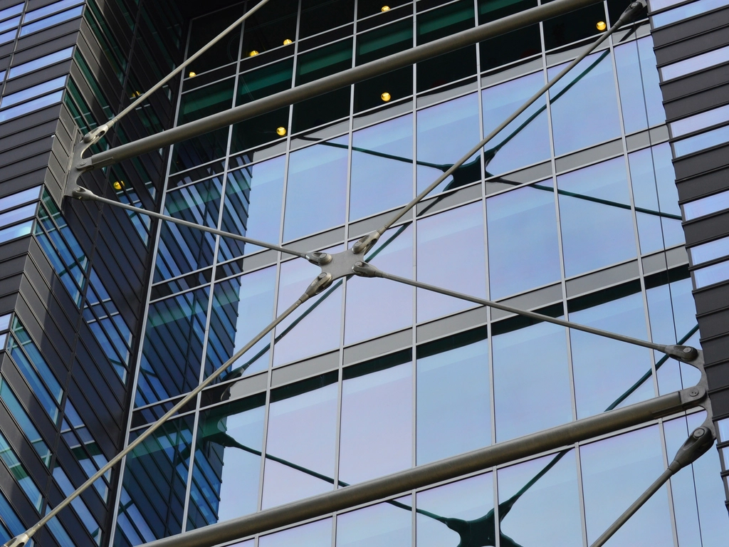 Close-up of a modern glass office building facade